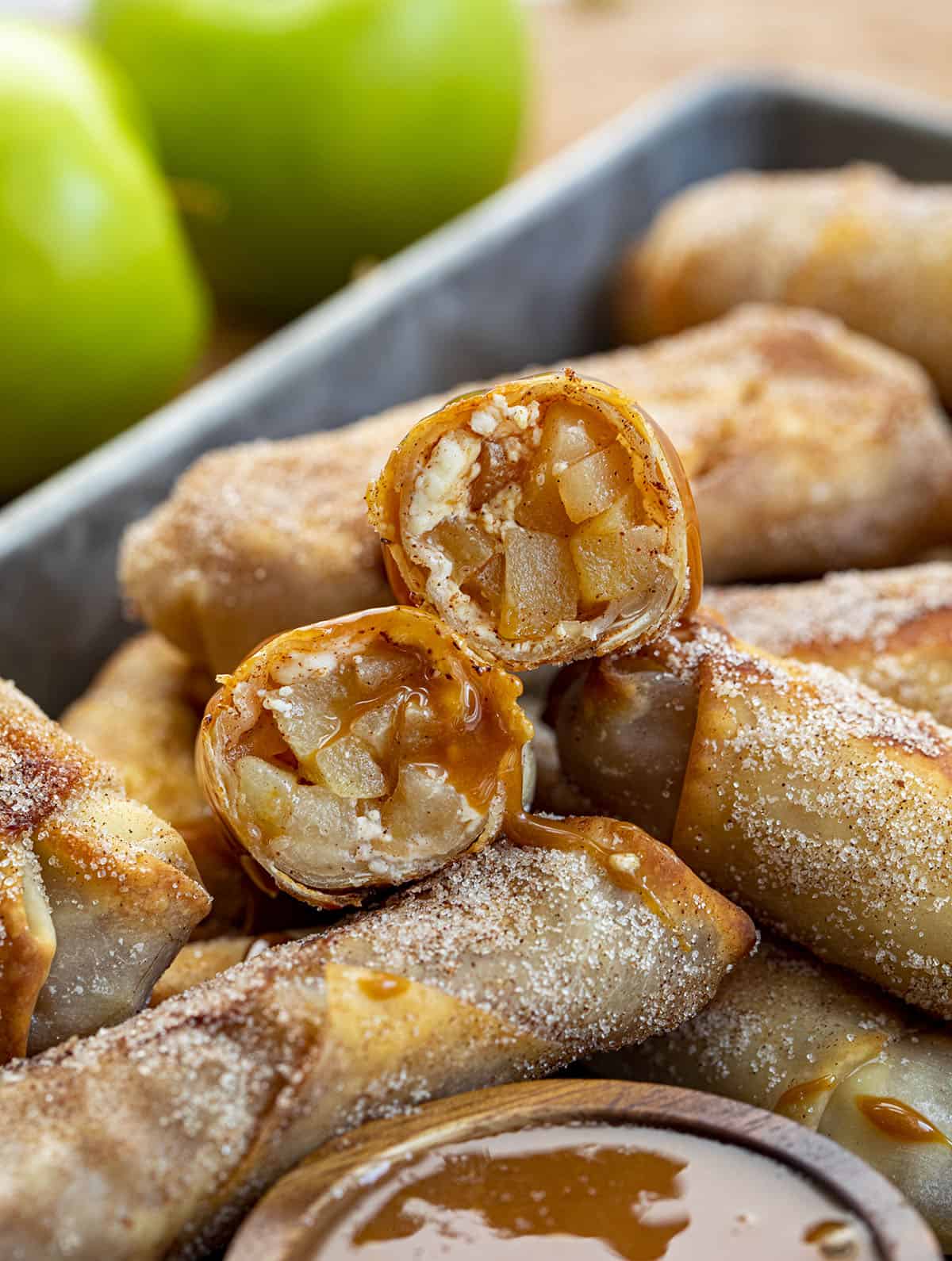 Cut Into Apple Pie Egg Rolls. Dessert Egg Rolls, Apple Egg Rolls, Apple Pie Egg Rolls, Easy Apple Pie Recipes, Dessert, Air Fryer Apple Pie Egg Rolls, Oven Apple Pie Egg Rolls, Super Bowl Desserts, Thanksgiving Desserts, Christmas Desserts, Snacks, i am baker, iambaker