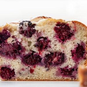 Close up of Cut Into Blackberry Loaf Showing Tender Crumb.