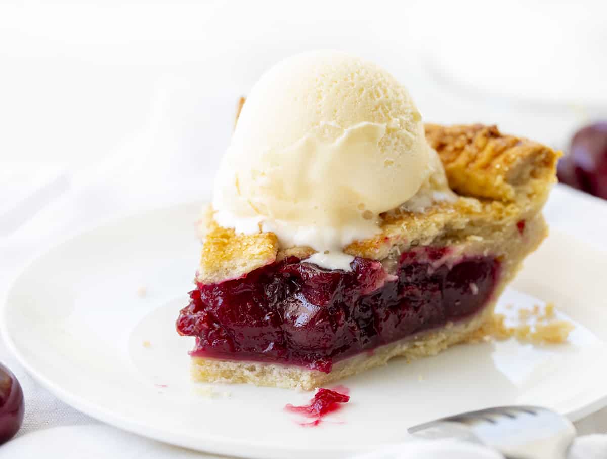 Piece of Cherry Pie with Bite Removed. Cherry Pie, Homemade Pie, Real Homemade Cherry Pie, How to Make Cherry Pie Filling, Best Homemade Pie Crust, Old Fashioned Cherry Pie, The Best Cherry Pie, Baking, Dessert, Christmas Pie, Thanksgiving Pie, Easy Cherry Pie, i am baker, iambaker