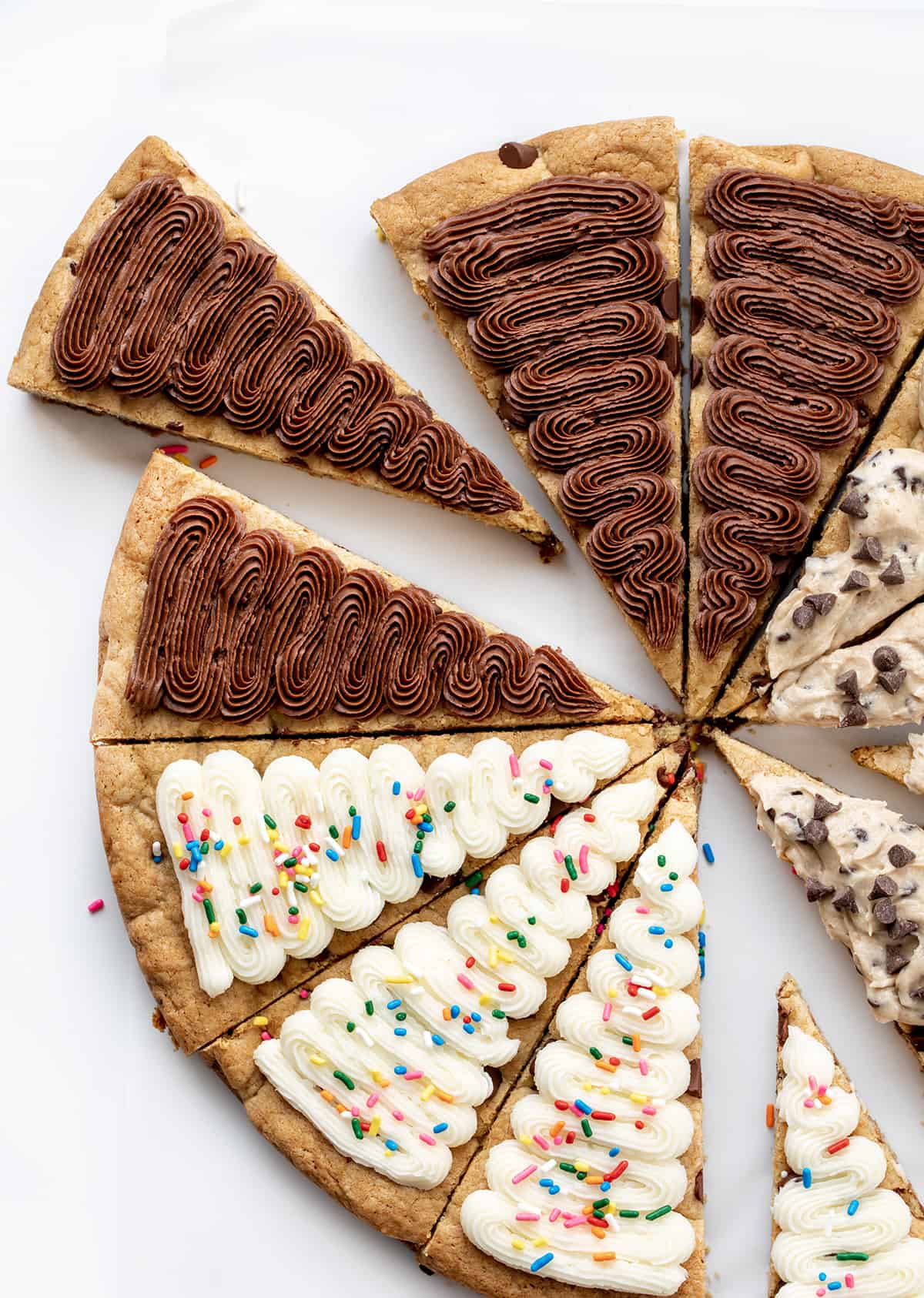 Cookie Cake for a Crowd with Chocolate Frosting, Vanilla Frosting, and Cookie Dough Frosting.