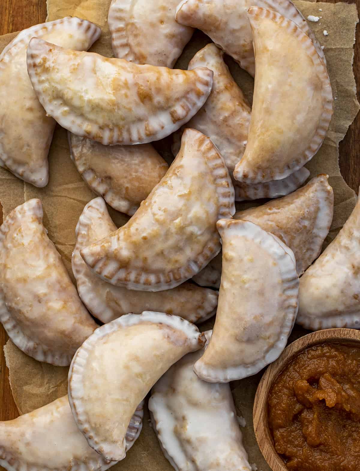 Glazed Pumpkin Cream Cheese Hand Pies with Pumpkin Puree. Dessert, Breakfast, Fall Desserts, Fall Snacks, Snacks, Party Recipes, Pumpkin Recipes, Easy Hand Pies, breakfast recipes, i am baker, iambaker