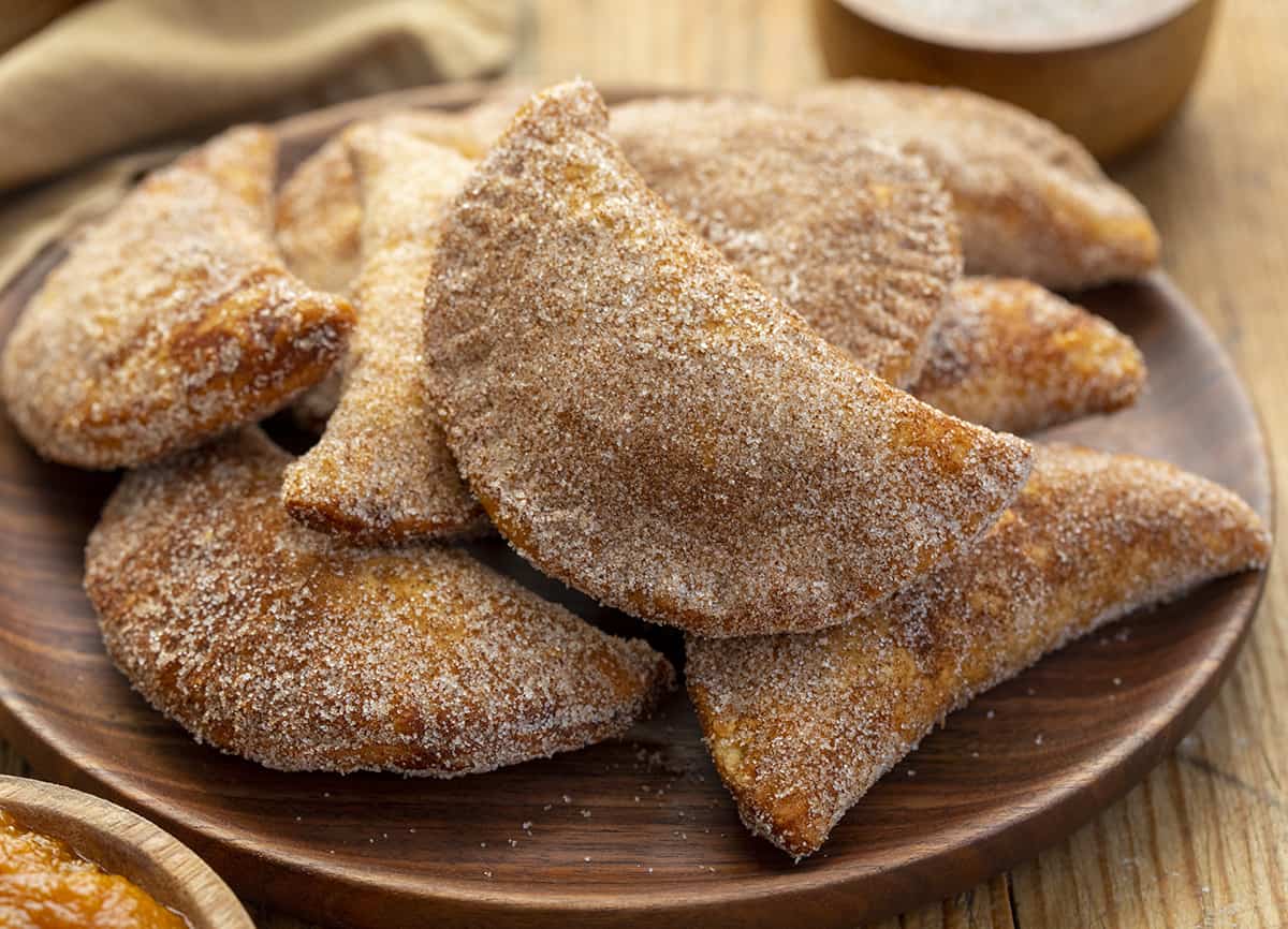 Pumpkin Hand Pies on a Plate. Pumpkin Hand Pies, Pumpkin Bombs, Pumpkin Desserts, Pumpkin Snacks, Pumpkin Spice, Pumpkin Crisps, Fried Pumpkin Pies, Individual Pumpkin Pies, Cinnamon Sugar Pumpkin Pies, fall recipes, Thanksgiving Recipes, Christmas Recipes, Thanksgiving Desserts, i am baker, iambaker