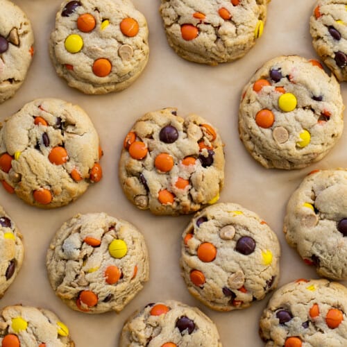 Reese's Pieces Peanut Butter Cookies from Overhead on Parchment Paper.